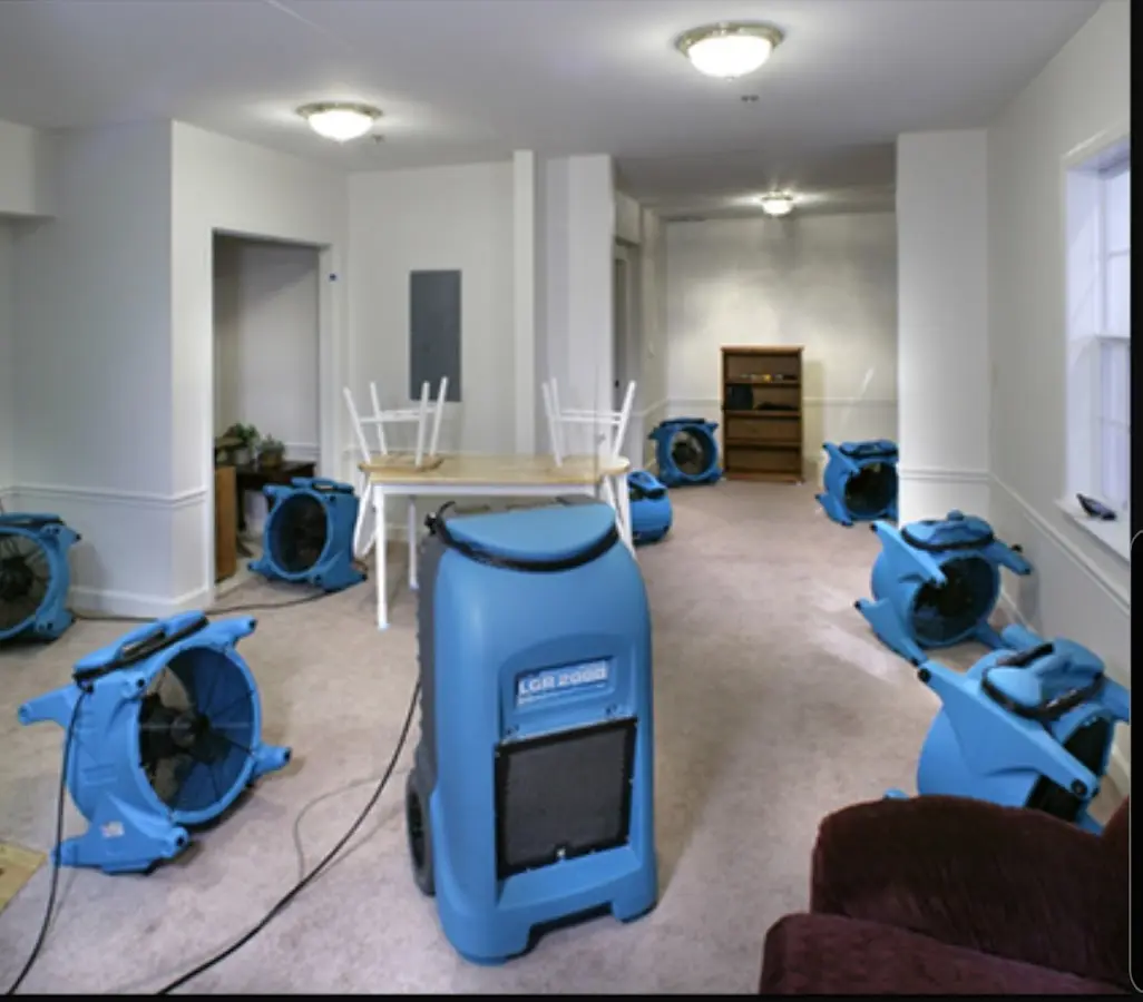 Air movers and dehumidifier setup for Water Extraction & Removal in Algona